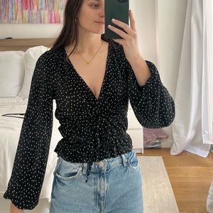 Black and white long sleeve top Soft material.Pull and bear. Size xs. Tie center